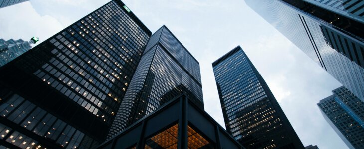 Skyscrapers viewed from below, reaching towards the sky