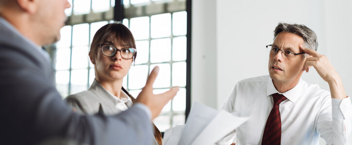 Businessman discussing with his colleague on a business meeting in the office. anger.